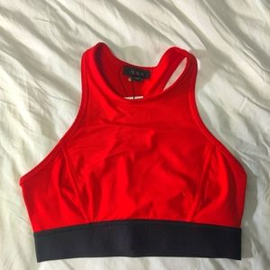 Never worn ALALA Red Racer back, high neck sports bra